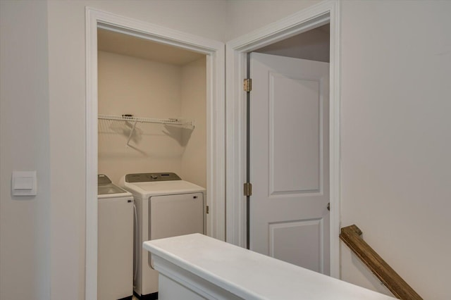 laundry room with washer and dryer