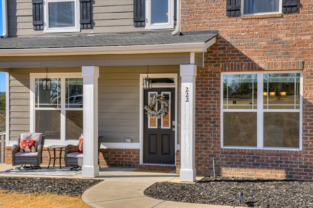 entrance to property with a porch