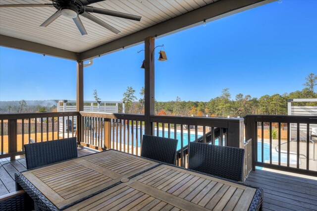 wooden deck with ceiling fan