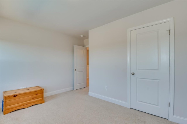 bedroom with light carpet