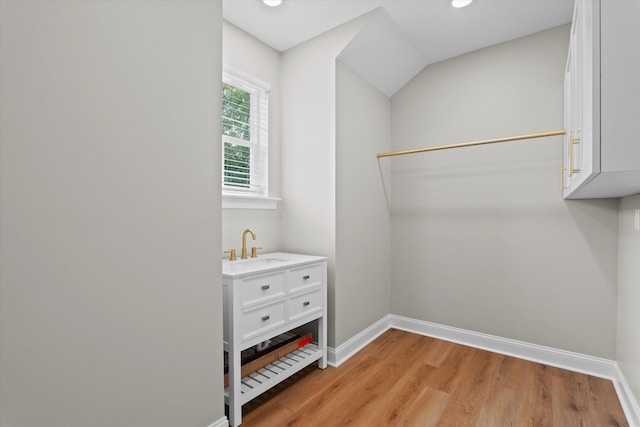 651 Moose Club Rd, Thomson, GA 30824 - spacious closet with light wood-style floors and a sink