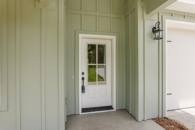 651 Moose Club Rd, Thomson, GA 30824 - doorway to property featuring board and batten siding