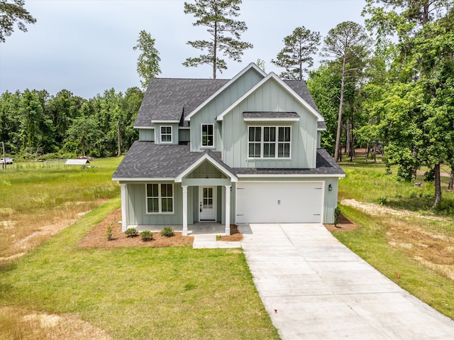 651 Moose Club Rd, Thomson, GA 30824 - view of front of property featuring a shingled roof, an attached garage, concrete driveway, and a front yard