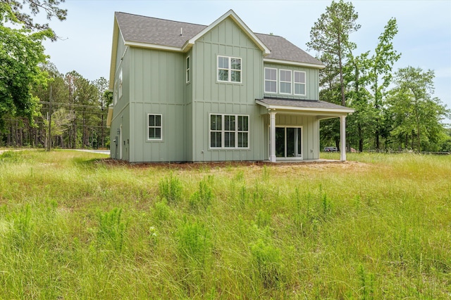 651 Moose Club Rd, Thomson, GA 30824 - rear view of property featuring board and batten siding and a shingled roof