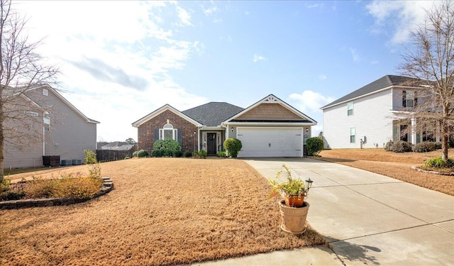 view of front facade with brick siding, concrete driveway, and a garage