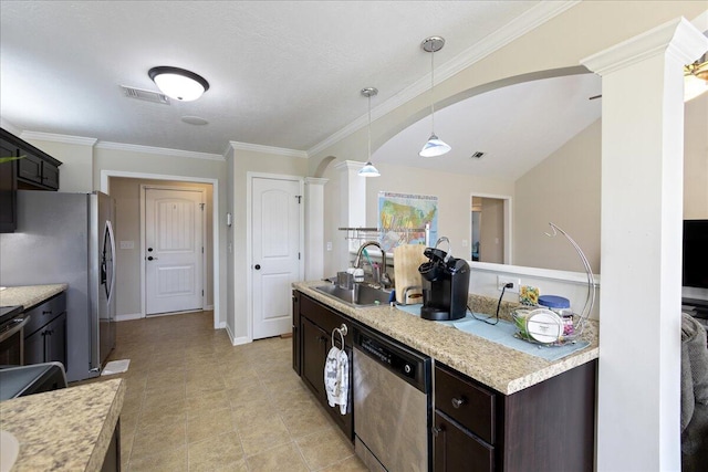 kitchen with light countertops, visible vents, appliances with stainless steel finishes, and a sink