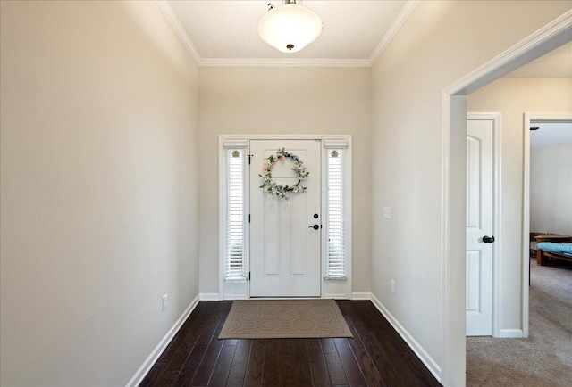 entrance foyer featuring dark wood-style floors, baseboards, and ornamental molding