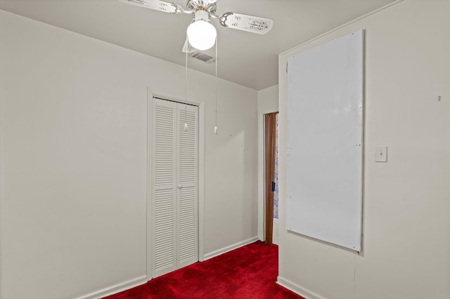 118 E Hale St, Augusta, GA 30901 - unfurnished bedroom featuring carpet flooring, a closet, baseboards, a ceiling fan, and attic access