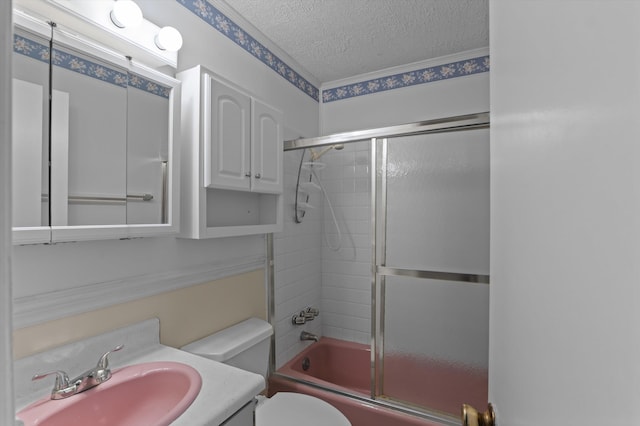 118 E Hale St, Augusta, GA 30901 - full bathroom with a textured ceiling, bath / shower combo with glass door, toilet, and vanity