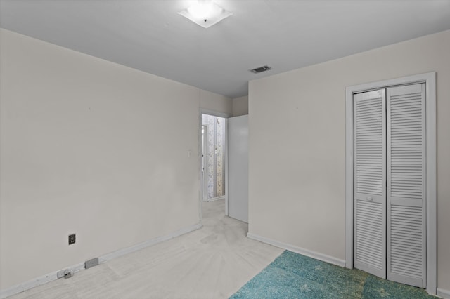 118 E Hale St, Augusta, GA 30901 - unfurnished bedroom featuring baseboards, a closet, and carpet floors