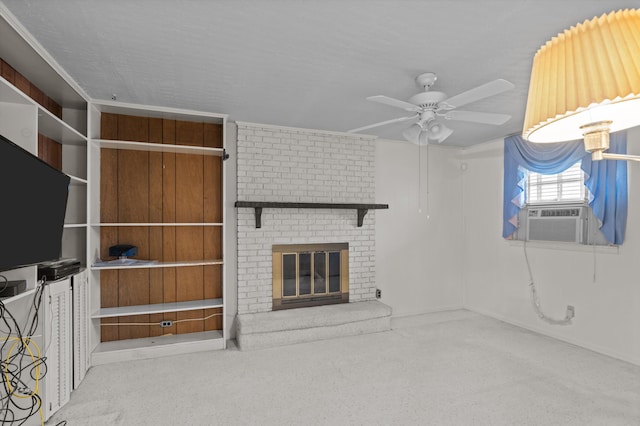 118 E Hale St, Augusta, GA 30901 - unfurnished living room featuring ceiling fan, cooling unit, a fireplace, and carpet flooring