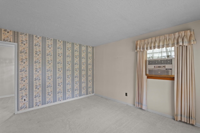 118 E Hale St, Augusta, GA 30901 - carpeted spare room with a textured ceiling, cooling unit, and baseboards