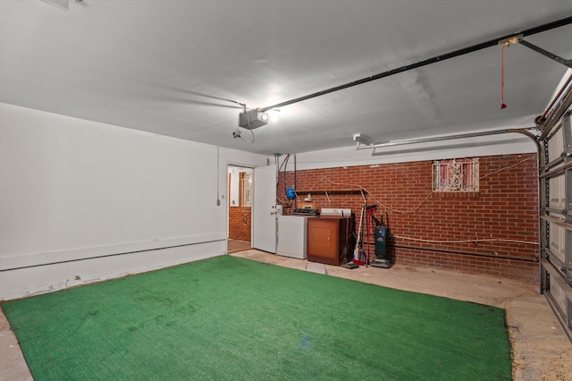 118 E Hale St, Augusta, GA 30901 - garage featuring a garage door opener and washer and dryer