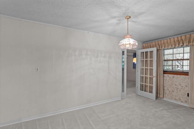 118 E Hale St, Augusta, GA 30901 - spare room featuring french doors, carpet flooring, a textured ceiling, and baseboards