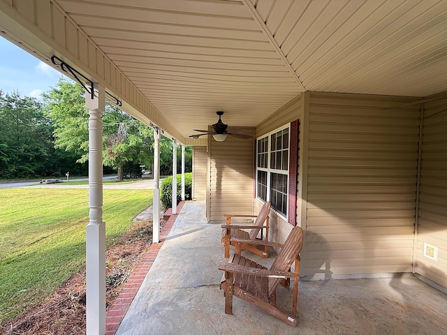 view of patio / terrace featuring ceiling fan