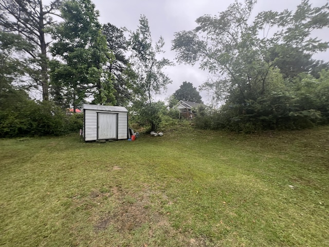 118 W Robinson Ave, Grovetown, GA 30813 - view of grassy yard with a shed and an outdoor structure