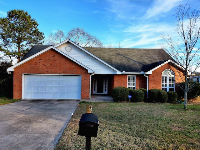 ranch-style house with a garage, a front lawn, concrete driveway, and brick siding