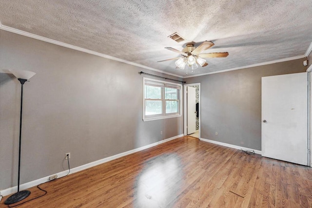 503 Mckenzie Ct, North Augusta, SC 29841 - empty room featuring wood finished floors, a ceiling fan, a textured ceiling, and crown molding