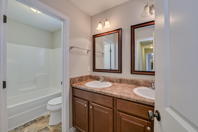 2731 Ashton Dr, Hephzibah, GA 30815 - full bath with a sink, toilet, double vanity, and stone finish flooring
