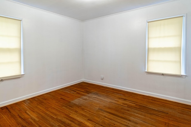 spare room featuring hardwood / wood-style flooring