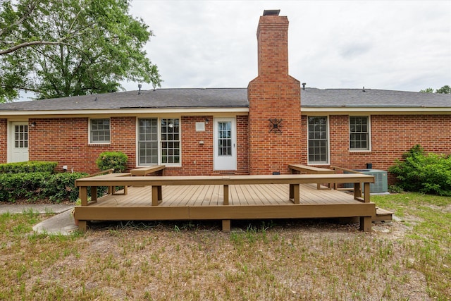 114 Sigman Pl, Martinez, GA 30907 - rear view of property featuring brick siding, central AC unit, a chimney, and a deck