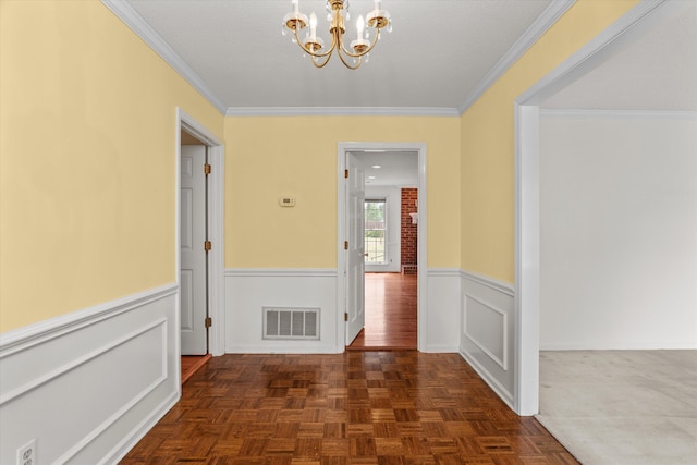 114 Sigman Pl, Martinez, GA 30907 - hallway with a chandelier, wainscoting, and ornamental molding