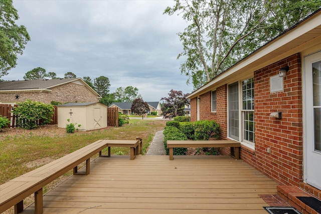114 Sigman Pl, Martinez, GA 30907 - deck with a storage unit, an outdoor structure, and a lawn