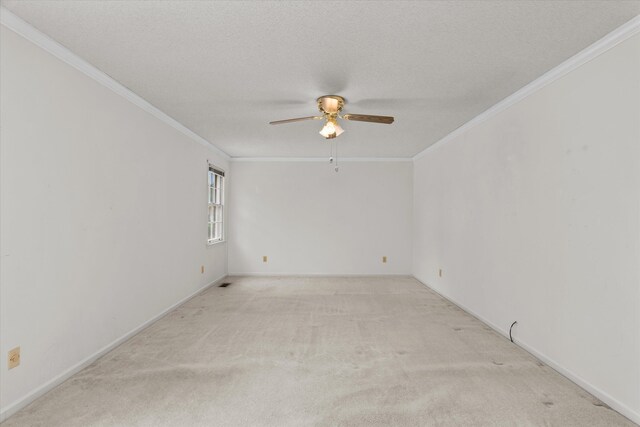 114 Sigman Pl, Martinez, GA 30907 - spare room with ceiling fan, crown molding, light carpet, and baseboards
