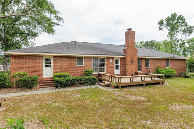 114 Sigman Pl, Martinez, GA 30907 - back of house with a yard, brick siding, a chimney, a wooden deck, and entry steps