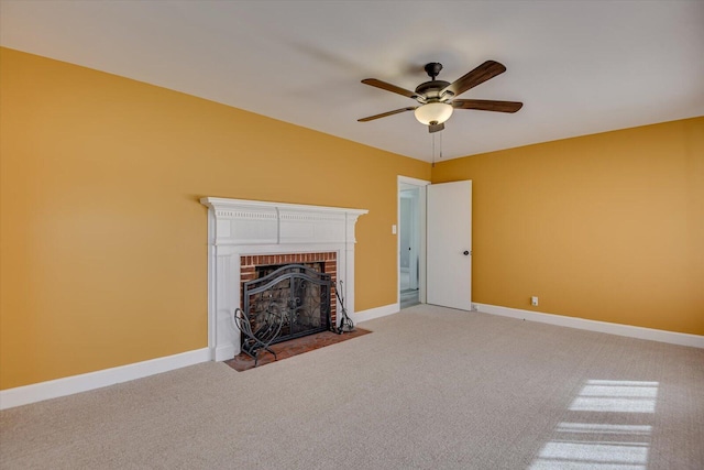 unfurnished living room featuring baseboards, carpet floors, and a brick fireplace