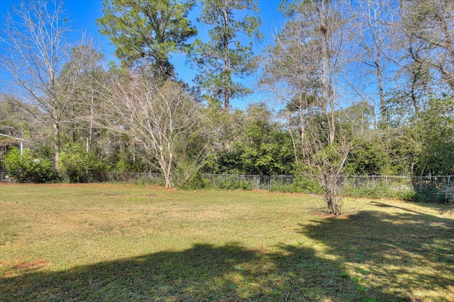 view of yard with fence