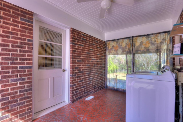 unfurnished sunroom featuring washer / clothes dryer, a ceiling fan, and visible vents