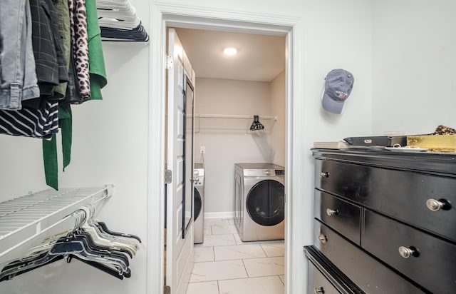 6047 Bakerville Ln, North Augusta, SC 29860 - laundry room featuring independent washer and dryer and light marble finish floors