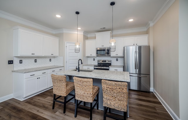 6047 Bakerville Ln, North Augusta, SC 29860 - kitchen featuring stainless steel appliances, white cabinets, backsplash, ornamental molding, and recessed lighting