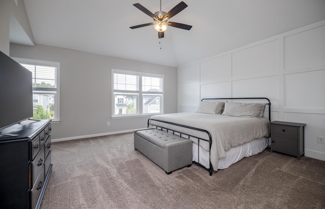 6047 Bakerville Ln, North Augusta, SC 29860 - carpeted bedroom with a decorative wall, multiple windows, a ceiling fan, and high vaulted ceiling