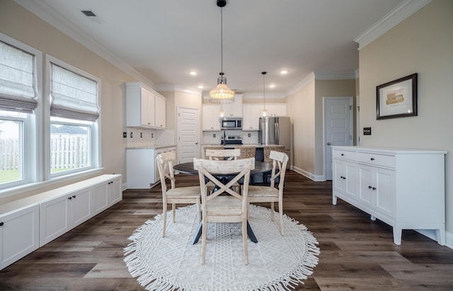 6047 Bakerville Ln, North Augusta, SC 29860 - dining room featuring ornamental molding, recessed lighting, and dark wood-style floors