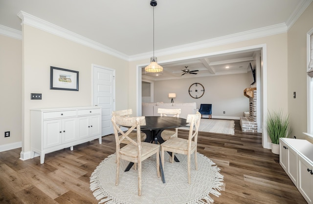 6047 Bakerville Ln, North Augusta, SC 29860 - dining space featuring crown molding, wood finished floors, a ceiling fan, coffered ceiling, and stairs