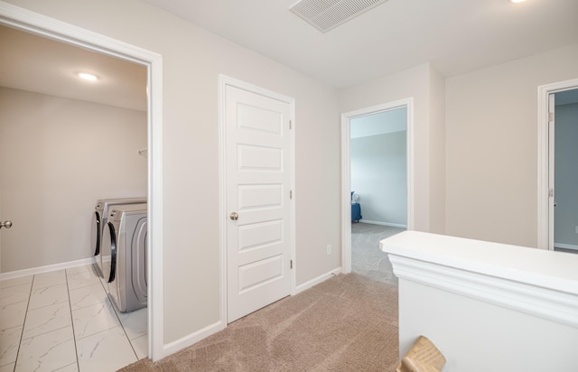 6047 Bakerville Ln, North Augusta, SC 29860 - laundry area with washing machine and dryer, light marble finish floors, and recessed lighting