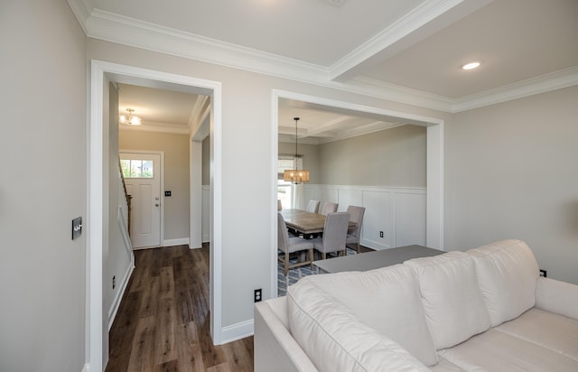 6047 Bakerville Ln, North Augusta, SC 29860 - living room featuring crown molding, a chandelier, and dark wood-type flooring