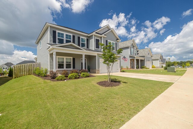 6047 Bakerville Ln, North Augusta, SC 29860 - craftsman house with concrete driveway, a garage, and a residential view