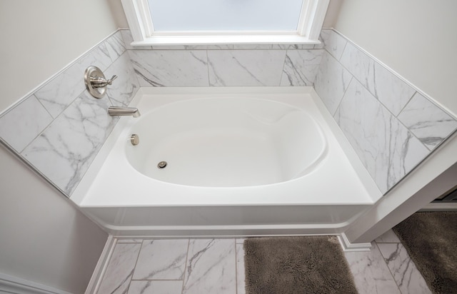 6047 Bakerville Ln, North Augusta, SC 29860 - bathroom with a garden tub and marble look tile flooring