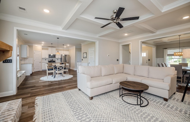 6047 Bakerville Ln, North Augusta, SC 29860 - living room featuring ornamental molding, coffered ceiling, wood finished floors, a ceiling fan, and a chandelier