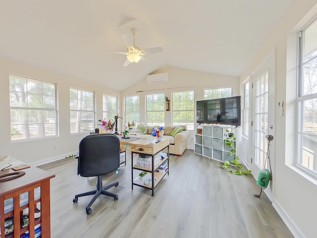 office space with lofted ceiling, an AC wall unit, baseboards, and wood finished floors