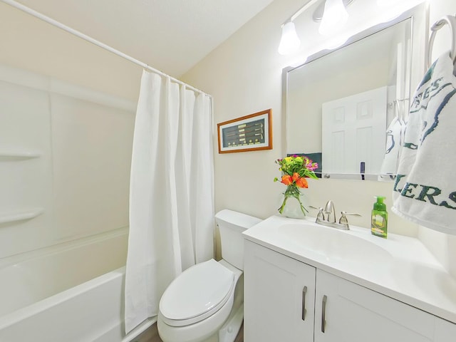 bathroom with toilet, shower / tub combo with curtain, and vanity