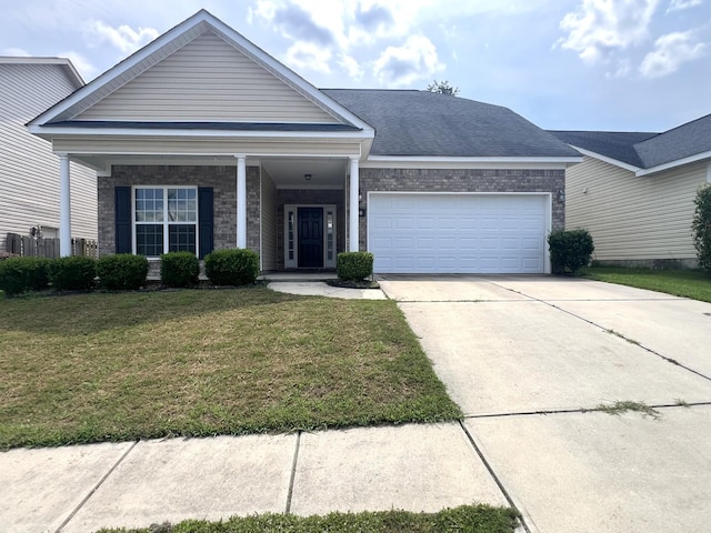 view of front facade featuring a garage and a front yard