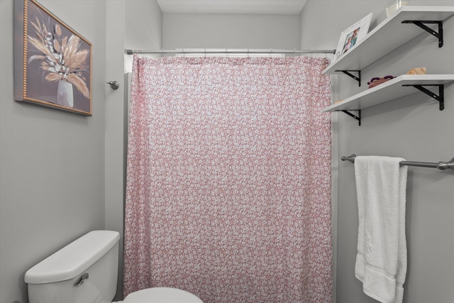 4256 Aerie Cir, Evans, GA 30809 - bathroom featuring toilet and a shower with shower curtain