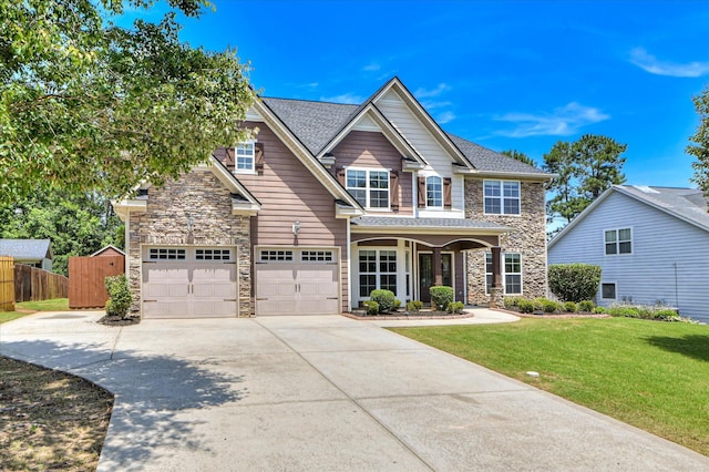 1164 Waltons Pass, Evans, GA 30809 - craftsman-style home with stone siding, driveway, and an attached garage