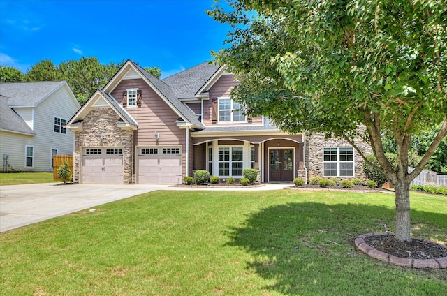 1164 Waltons Pass, Evans, GA 30809 - view of front of house featuring stone siding, driveway, french doors, and a porch