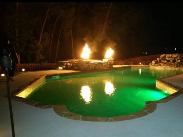 1164 Waltons Pass, Evans, GA 30809 - pool at twilight with a patio area
