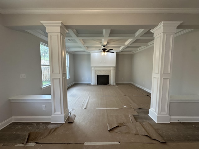 unfurnished living room with decorative columns, a ceiling fan, a brick fireplace, and coffered ceiling